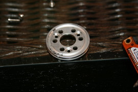 [Washer that holds the platter onto the drive spindle.]