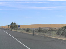 [Sign: Journey Through Time: Oregon Scenic Byway]